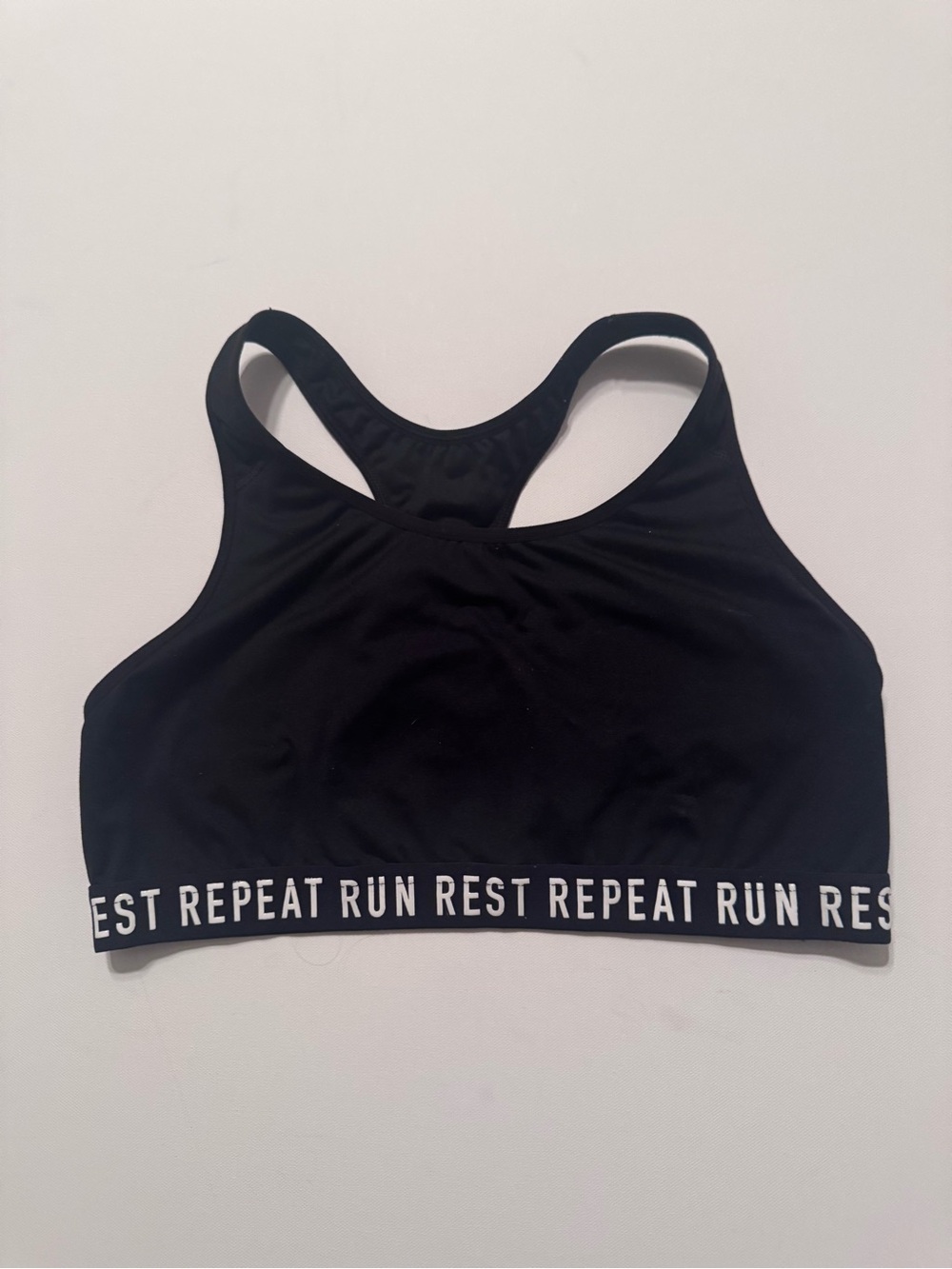 Black Racerback Sports Bra with 'Run Rest Repeat' Band
